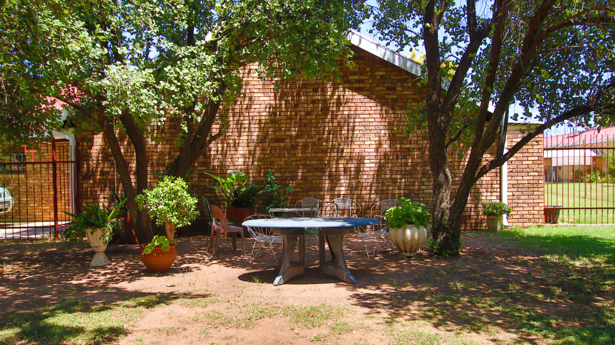 Shaded garden courtyard at an SAVF home for older persons